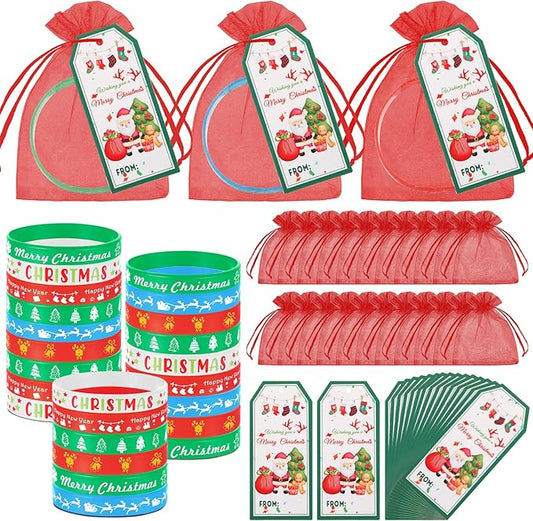 Liliful 72 Pcs 24 Set Christmas Students Gifts, Christmas Silicone Wristbands with Gift Label Tags and Organza Bags for Kids Christmas Stocking Stuffers Classroom Gifts Party Favors